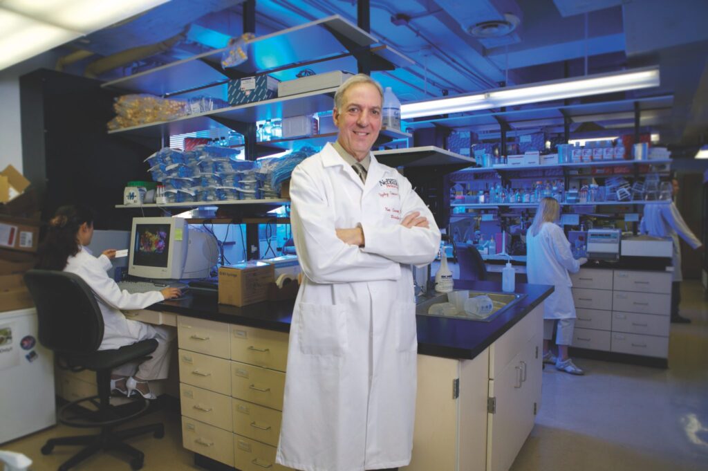 Dr. Ken Cowan poses in lab
