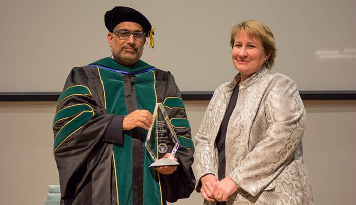 Faculty holding an award