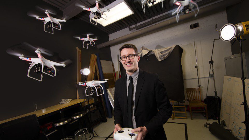 Prof. Matt Waite with drones in the air