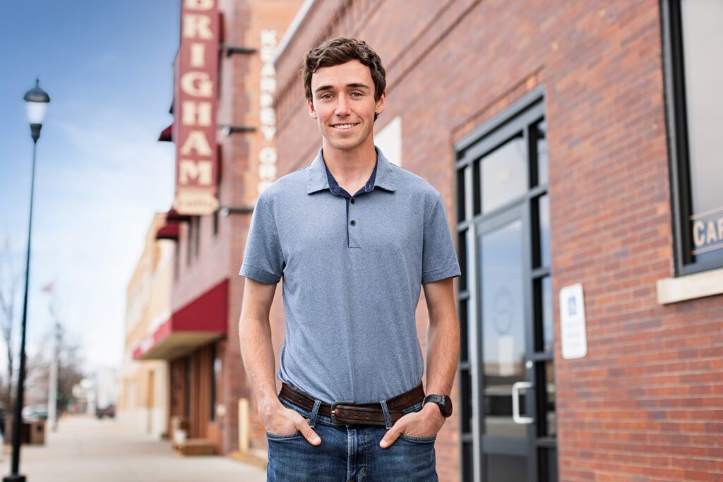 Justin Vrooman poses in downtown Kearney