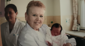 Sharon Redding holding an infant